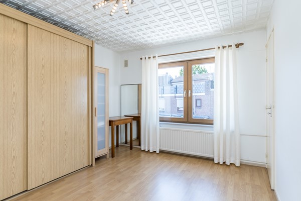 Foto - Verkocht onder voorbehoud: Nette twee- onder- een – kapwoning met serre, zonnige tuin en garage in Bocholtz